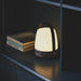 Nordic-inspired Lite-up LED lamp with rechargeable battery and wooden handle, ideal for cozy living rooms and patios.