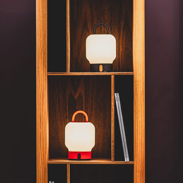 Loome LED table lamp by Kooduu: compact, rechargeable, and elegant lighting solution with 2700K warm ambiance.