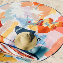 Charger l&#39;image dans la galerie, Take the Love Rug by Basil Bangs with you wherever you go! This versatile indoor-outdoor mat is spill-proof, padded, and compact, perfect for picnics, beach trips, and playtime with babies and pets. The signature water-repellant fabric makes cleaning up spills and messes a breeze, and the padded, waterproof underside provides comfort and dryness on any surface.

