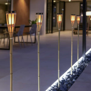 Solar-powered Hiama garden spike from Newgarden: Handcrafted bamboo design with LED lighting for stunning outdoor visuals.