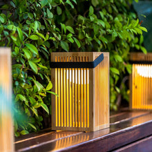 Load image into Gallery viewer, Okinawa Lantern: a handcrafted bamboo masterpiece from Newgarden with an innovative rechargeable bulb for perfect outdoor lighting.
