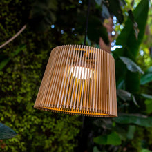 Load image into Gallery viewer, Illuminate your outdoor space with Okinawa Hang, a handmade bamboo pendant lamp with a convenient wireless, rechargeable bulb.
